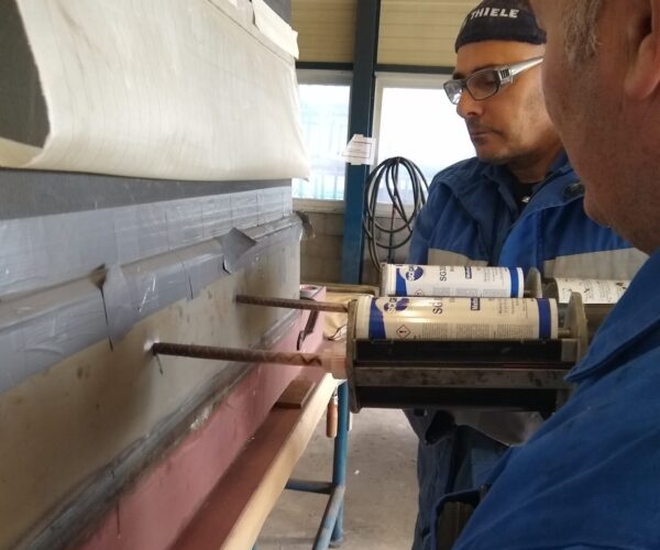 Damen Naval's Herman Vermeulen (with hat) and John Akihary working a QUALIFY sample at Vlissingen-East.