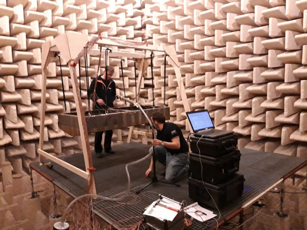 Dry impact hammer measurements in anechoic room to determine natural frequencies, mode shapes and transfer functions of the steel-construction.