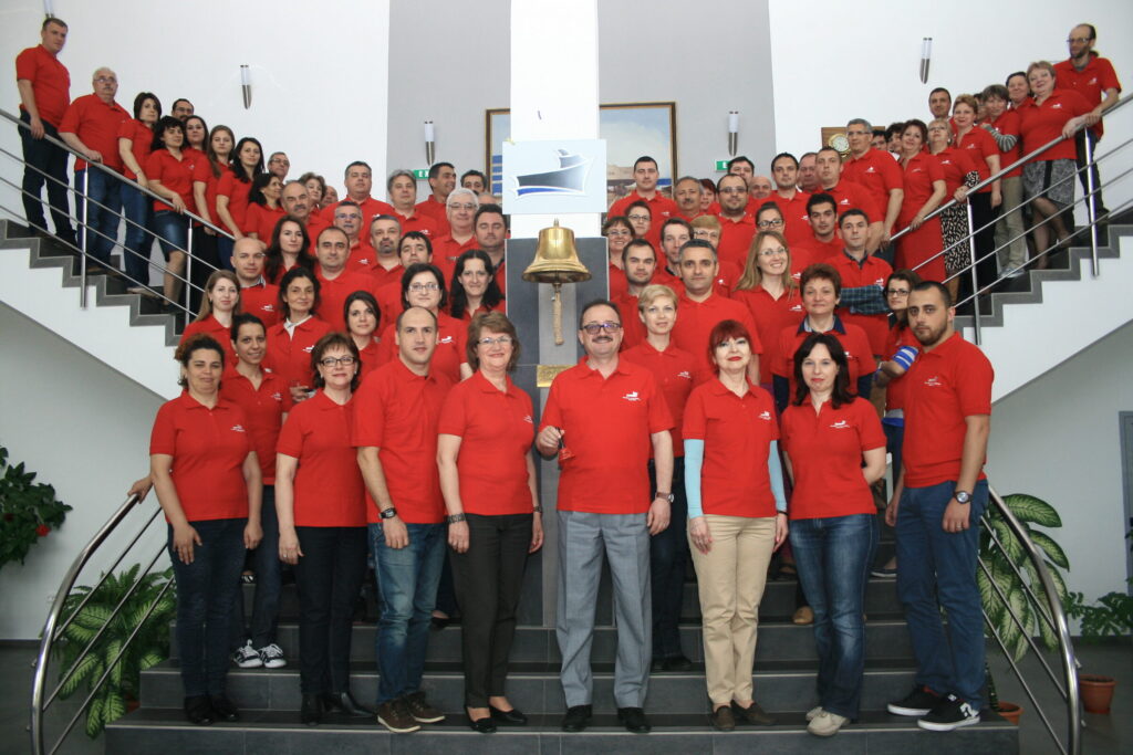 MEGA's team with Managing Director Florin Rascanu in the centre of the front row.