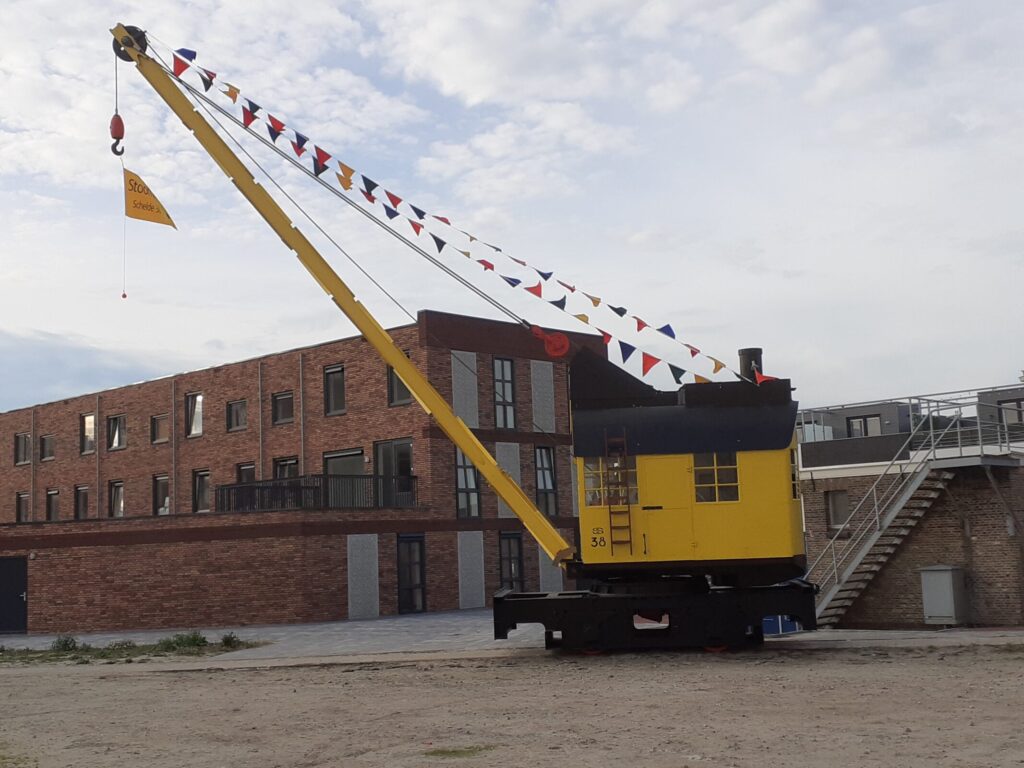 The historic crane stands on an original piece of railway track that used to run across the shipyard.