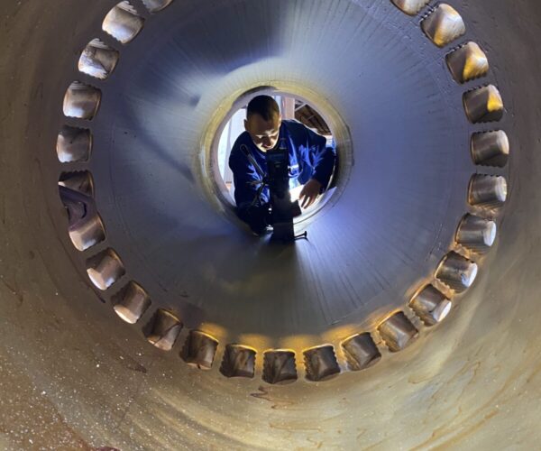 DSMS employee Benjamin is carrying out some modifications to a cylinder liner.