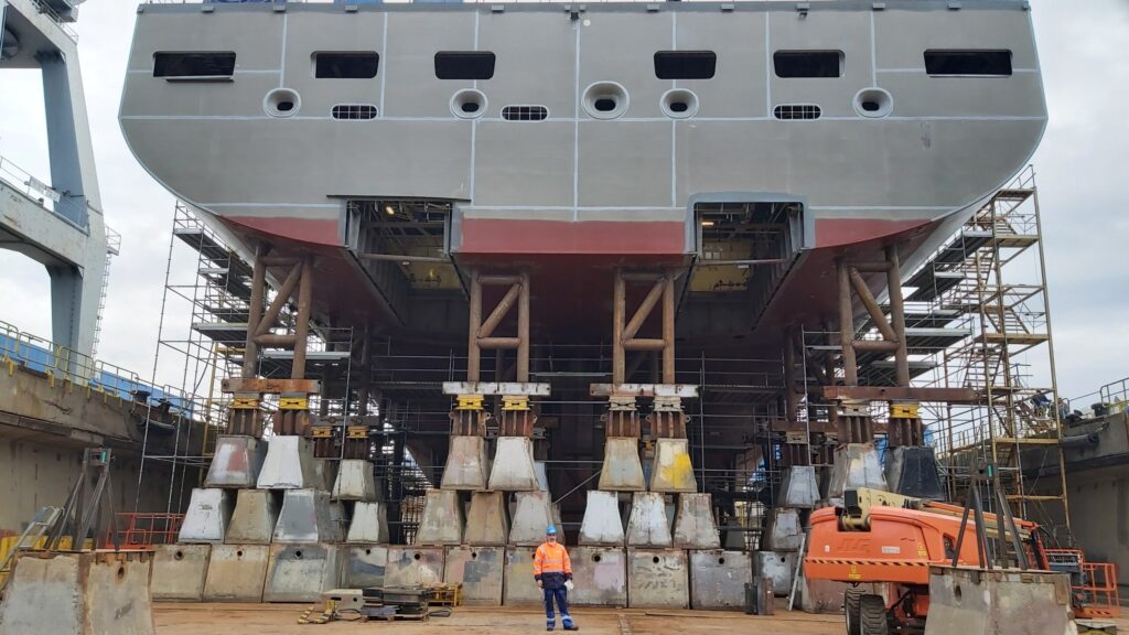 Project Director Arjan Risseeuw is dwarfed by one of the CSS' modules.