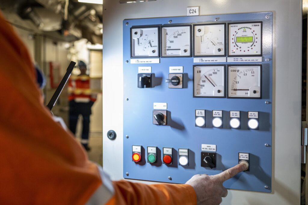 With the push of a button, the power was switched on aboard the Combat Support Ship.