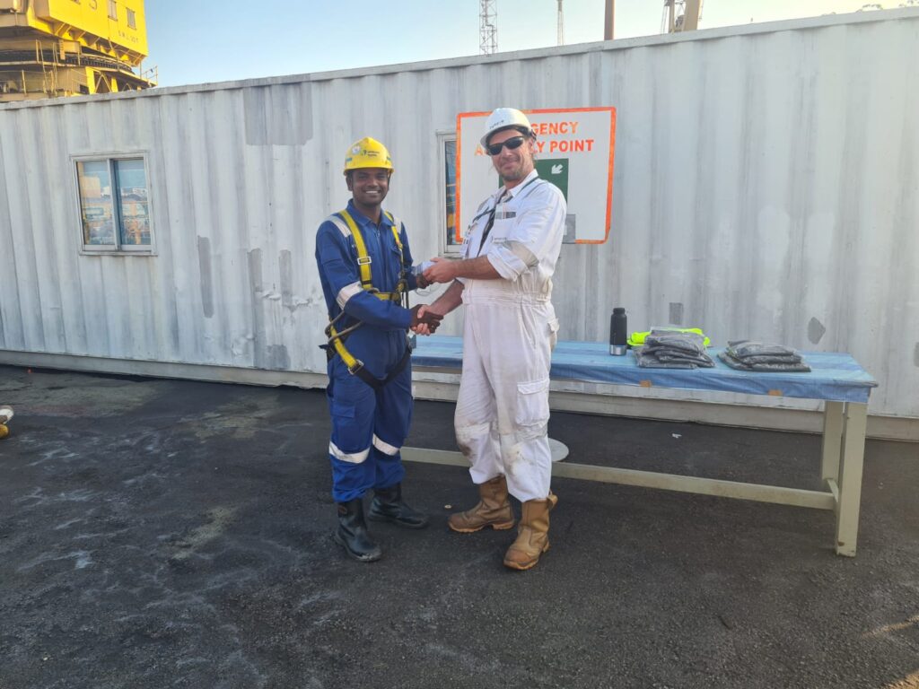 Jorrit (right) during an HSE awards ceremony at the shipyard in Singapore.