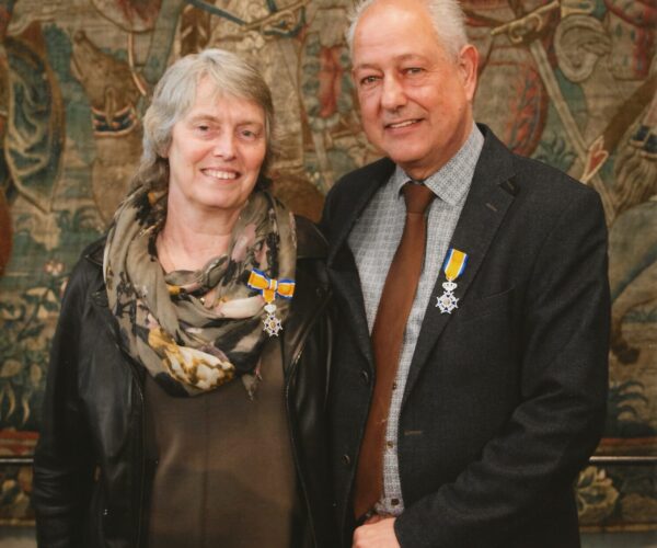 Elna and Peter Geschiere show their King's Honours.