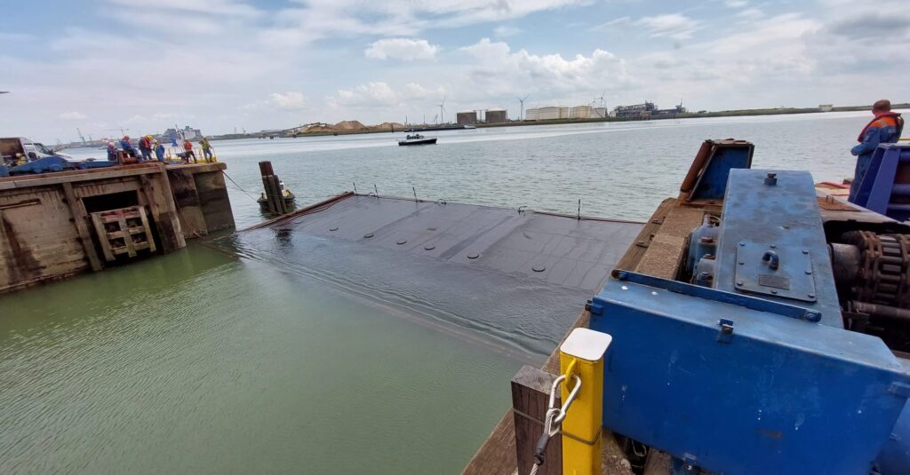 The dock door was tilted outwards and, from there, it was foated to the surface.